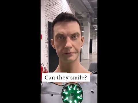 The humanoid robot smiles
