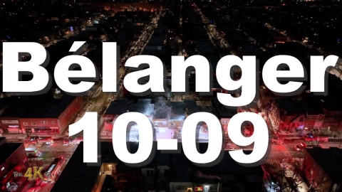 St-Michel: Bird's-eye-view of fire scene commercial + residential...